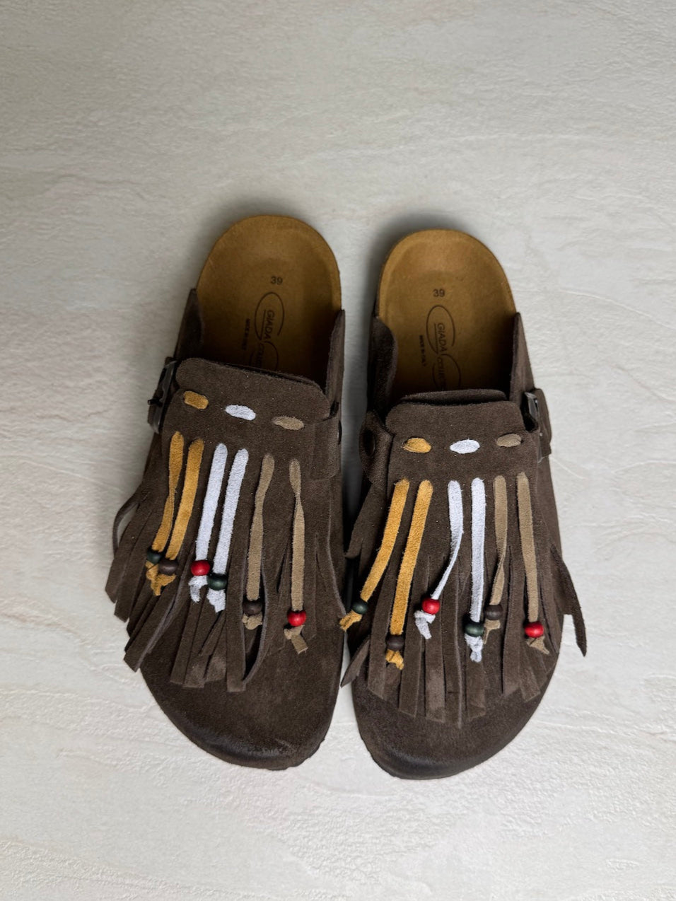 Mules camoscio con frange