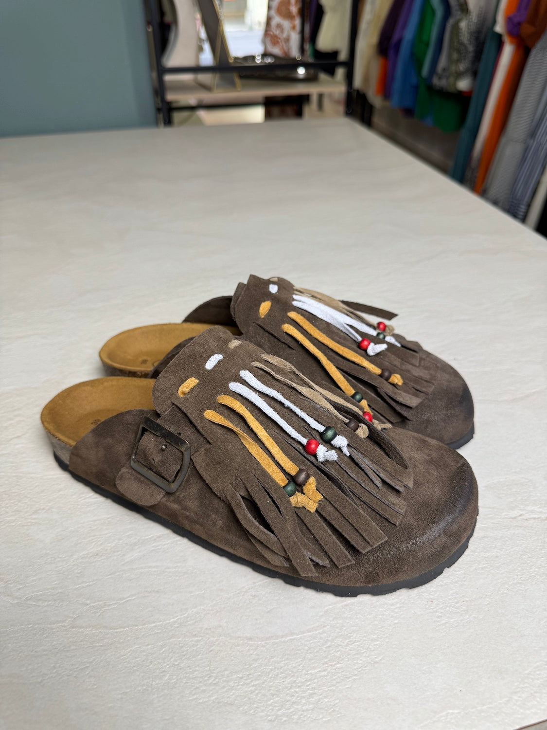 Mules camoscio con frange